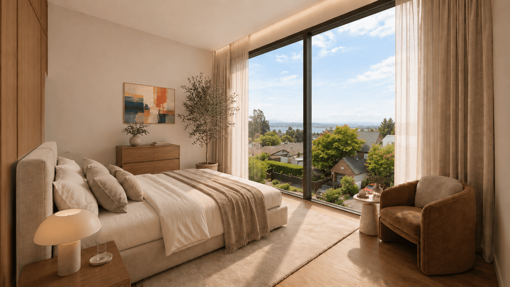 Primary bedroom with floor-to-ceiling window framing a bay view